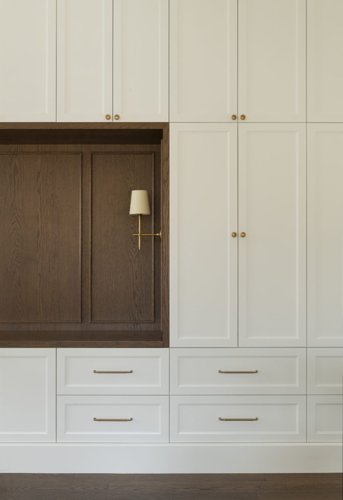 custom wall sconce in built-in cabinet