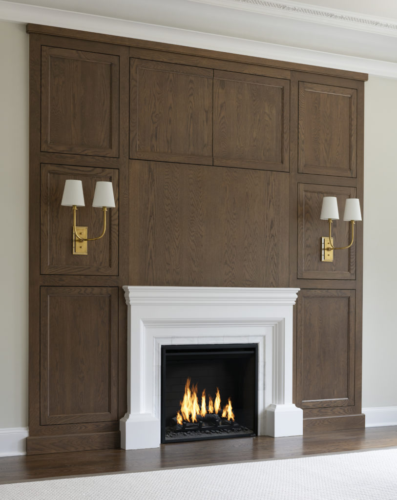 Fireplace with wood wall covering surrounding it