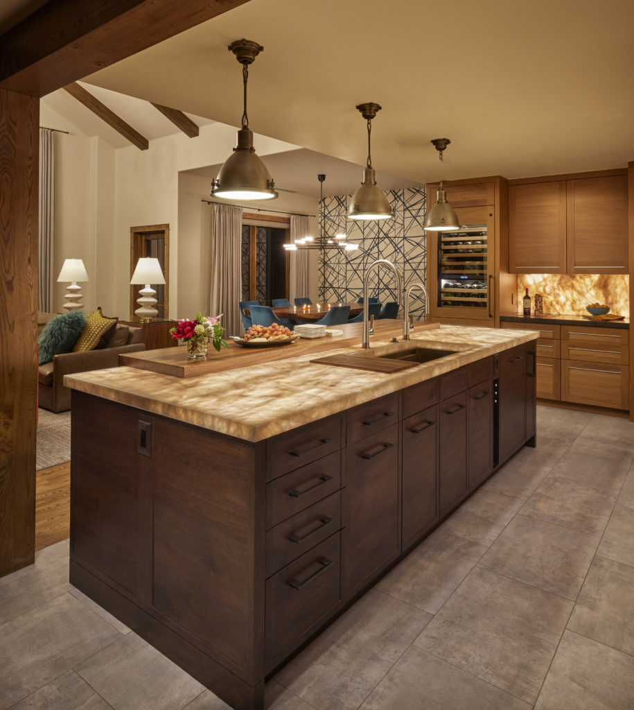 night view of kitchen remodel project with lights on