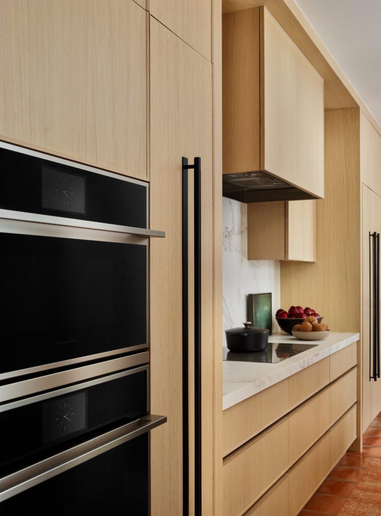 custom cabinetry storage near kitchen oven