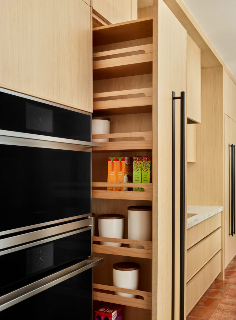 Pull-out storage near kitchen oven