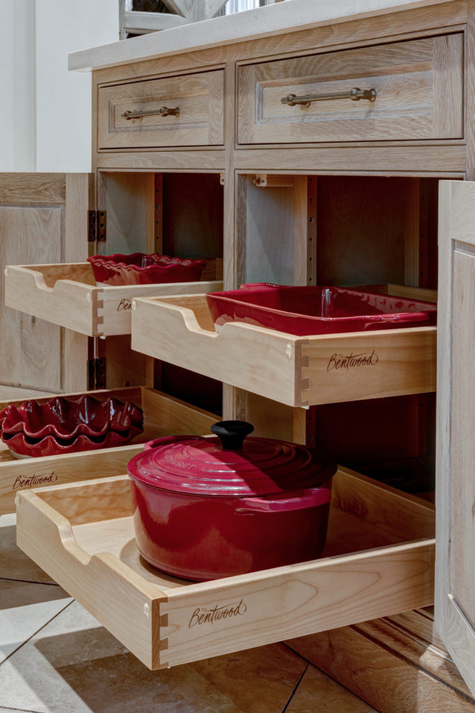 red bake ware in drawers