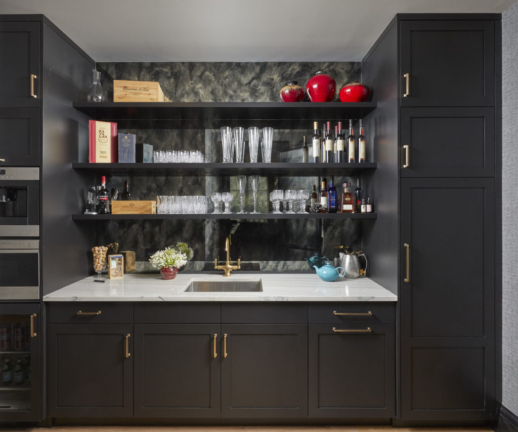 the fully stocked wet bar area