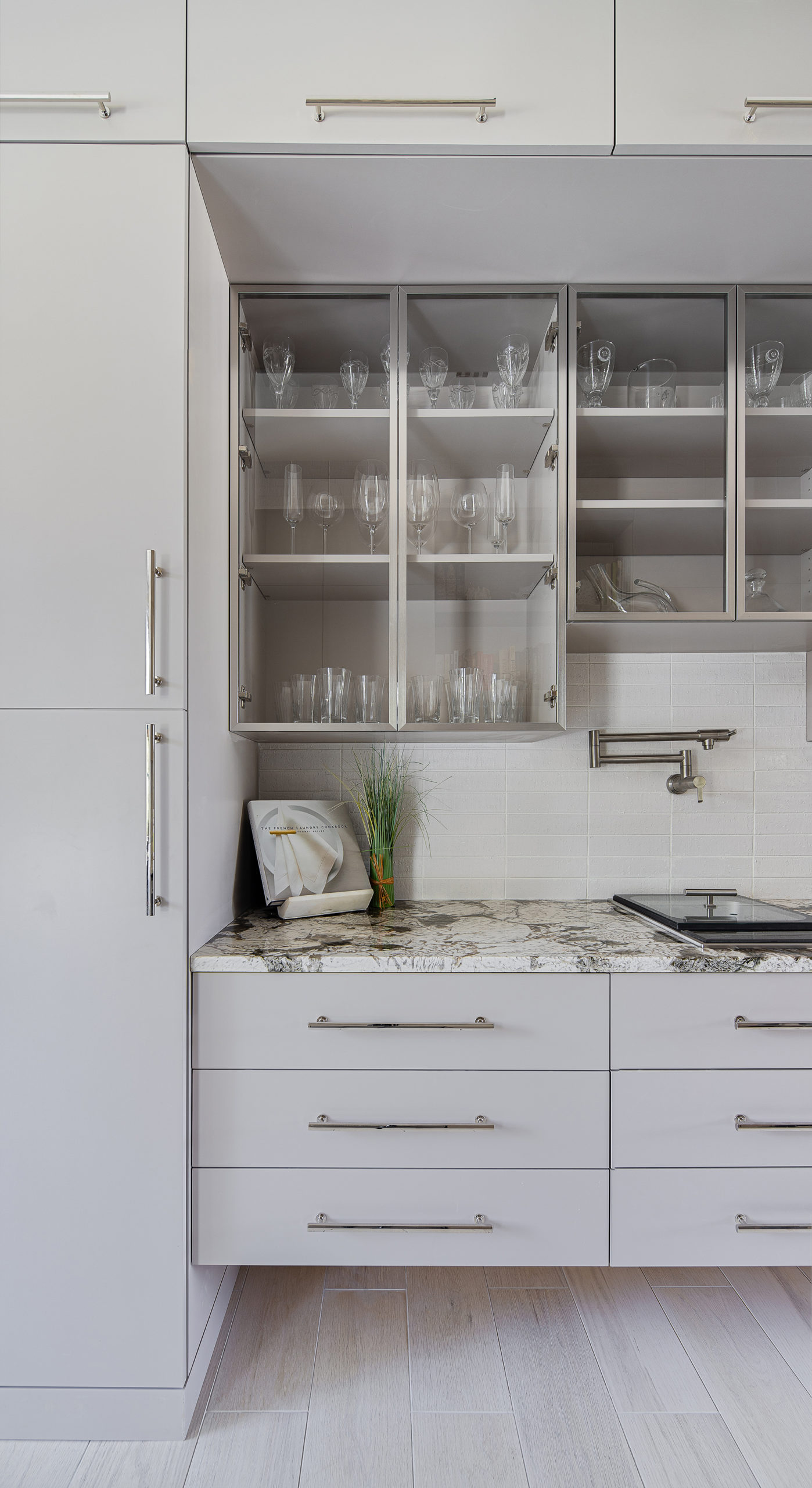 An Organized Tall Pantry with cabinet doors closed